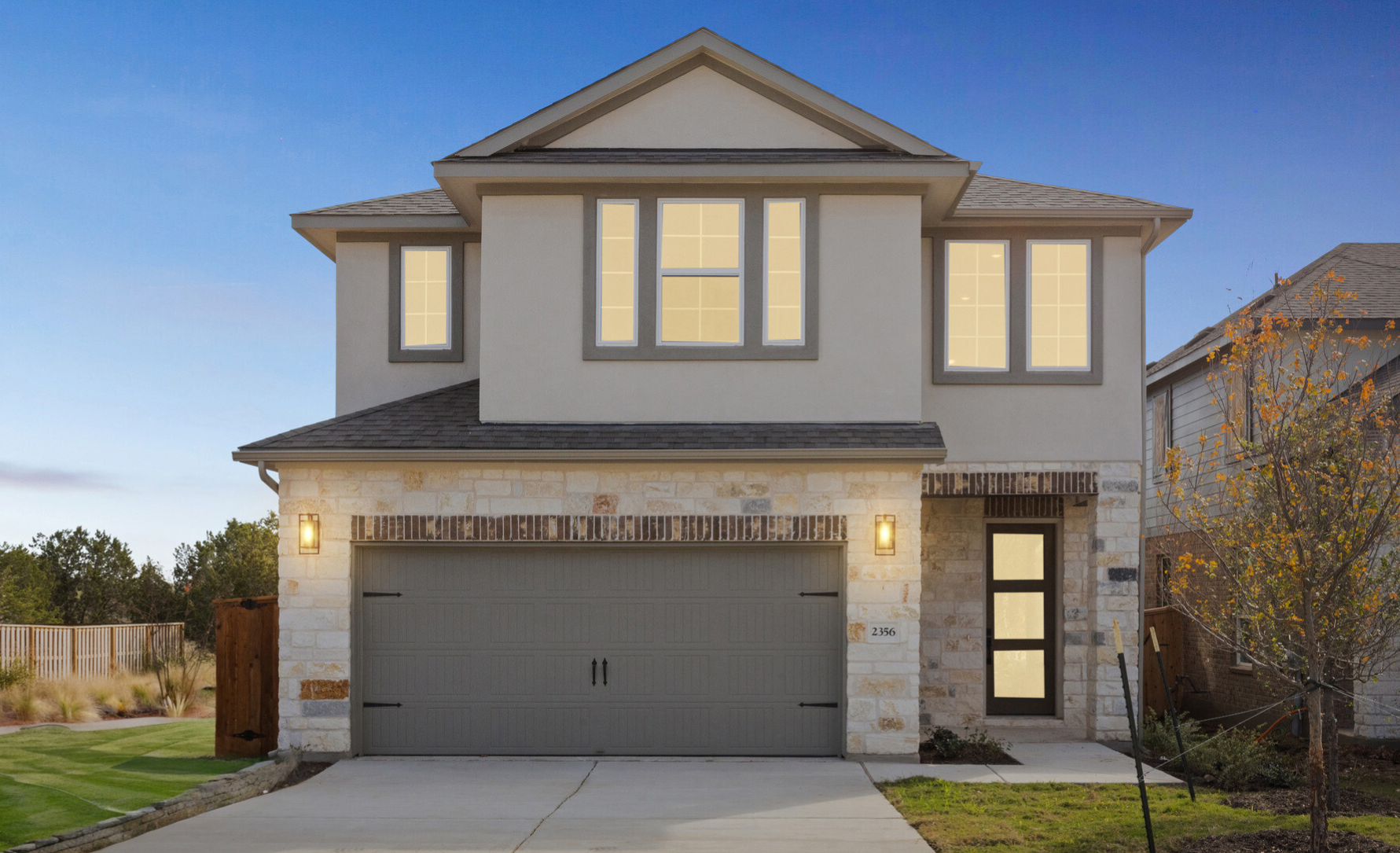 Exterior dusk photo of 2356 Sawdust Drive GFO Luxury New Home